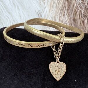 Aged Brasstone Goldtone Love to Love inscribed Jessica Simpson Bangle Bracelets